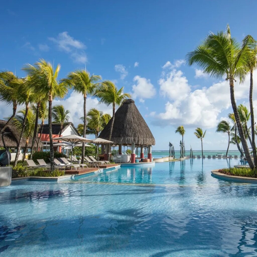 Resort pool beside the lagoon in Mauritius